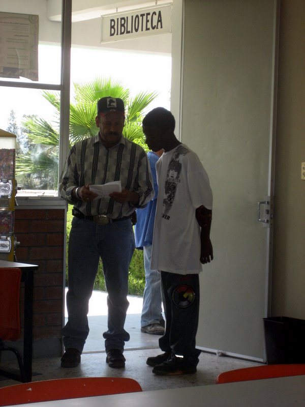 Joseph C. practicing Spanish outside a library in Durango